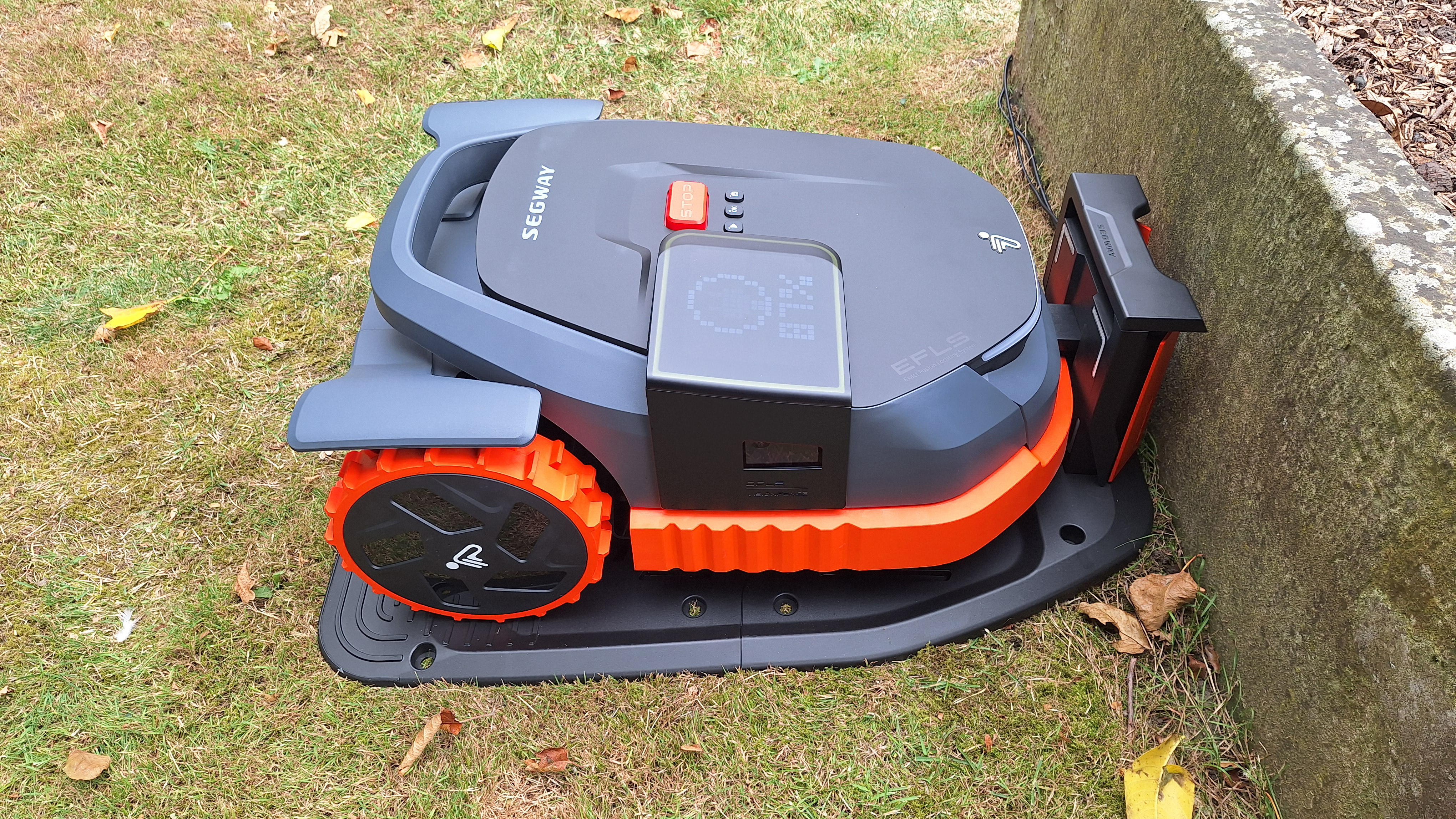Segway Navimow X350 robot lawn mower on its charge station