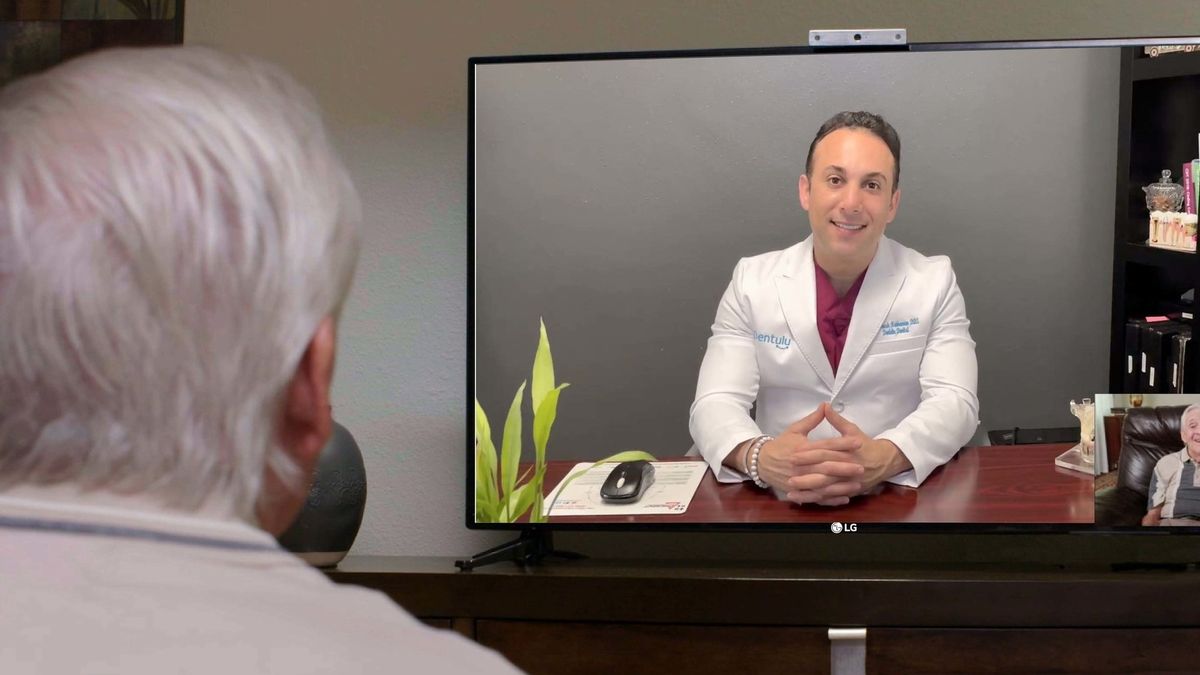 A patient talking to a doctor on their LG TV