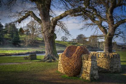 'Artists' House', the contemporary cottage on the grounds of the New Art Centre in Wiltshire, is the setting for the centre's second design exhibition. Willow sculptor Laura Ellen Bacon contributed with her nest-like installations, which wrap around trees