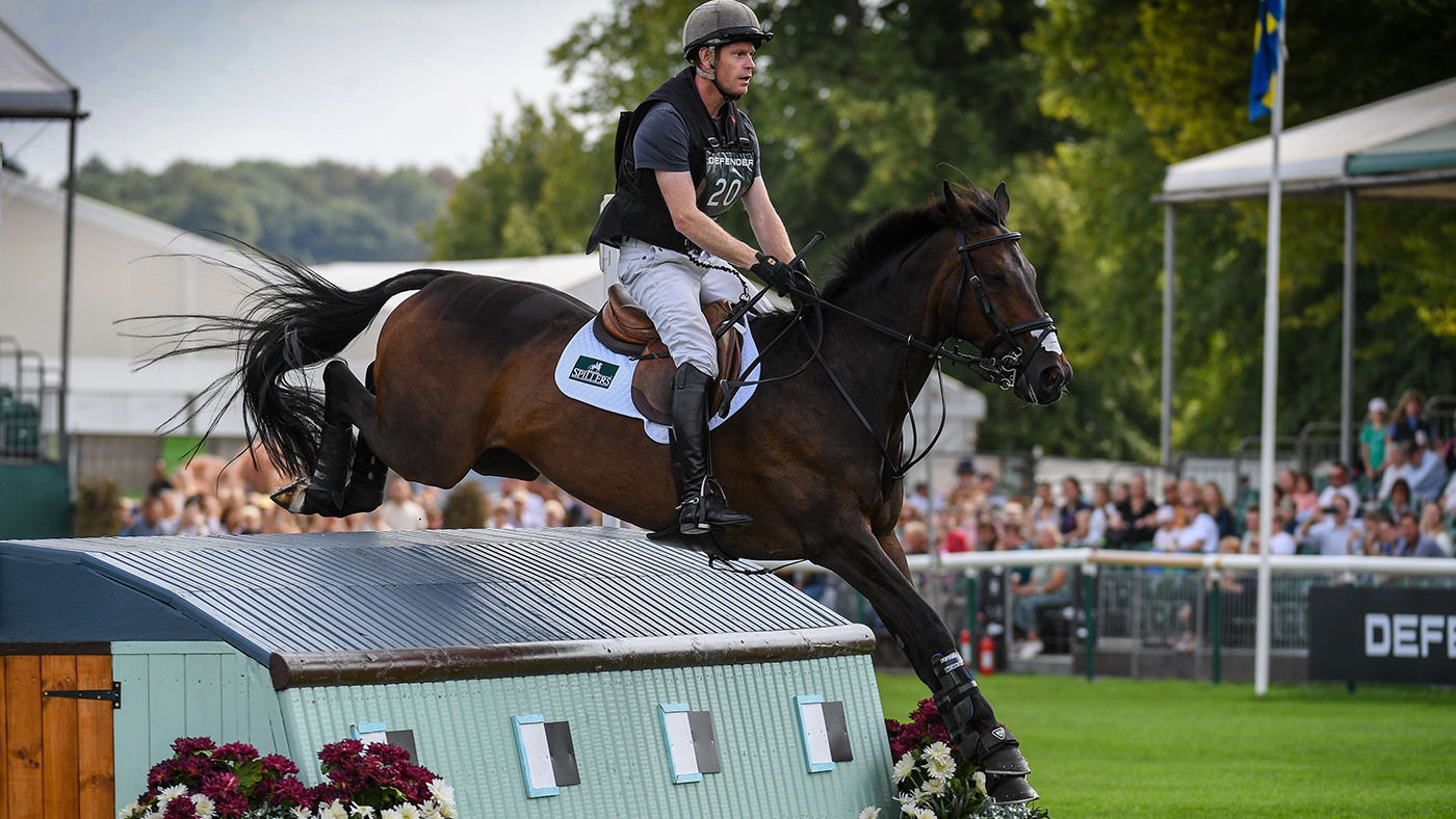 Angus Smales (GBR) riding ESI Pheonix in cross country stage at the Land Rover Burghley Horse Trials, in the park land surrounding Burghley House near Stamford in Lincolnshire in the UK between 31st August - 4th September 2022 Land Rover Burghley Horse Trials