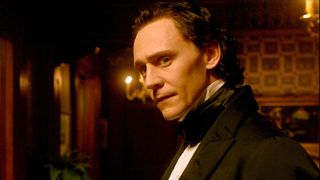 Thomas Sharpe (Tom Hiddleston) in a suit in a scene from Guillermo del Toro's "Crimson Peak"