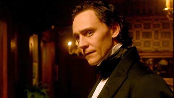 Thomas Sharpe (Tom Hiddleston) in a suit in a scene from Guillermo del Toro&#039;s &quot;Crimson Peak&quot;