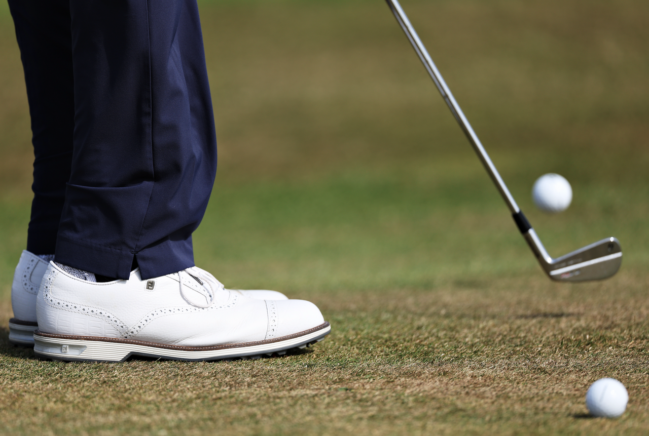 A close up of Tiger Woods' shoes