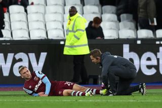 West Ham United's Jarrod Bowen receives treatment on an ankle injury at the end of his side's draw with Bristol City in the FA Cup