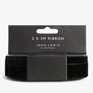 Picture of black velvet ribbon in packaging