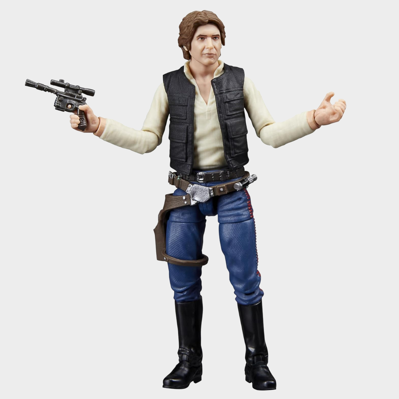 Star Wars The Vintage Collection Han Solo shrugging with a blaster in hand on a plain background