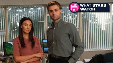 Michelle Keegan and Douglas Booth next to the What Stars Watch franchise badge