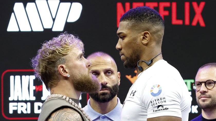 Jake Paul facing off with Anthony Joshua ahead of their heavyweight boxing bout live on Netflix. 