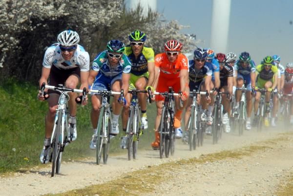 Julien B&eacute;rard (Ag2r la Mondiale) leads the peloton over one of the gravel sections