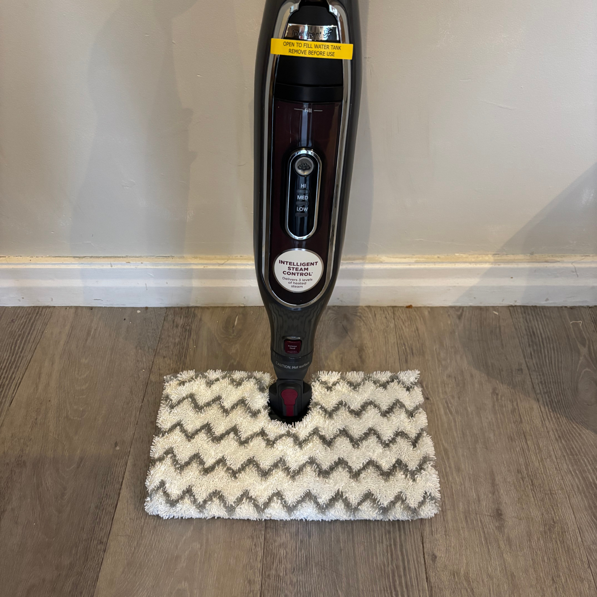 Shark Klik n&amp;rsquo; Flip Automatic Steam Mop mop head on laminate floor