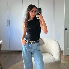 Influencer Liv Perez wearing a Reformation Dusk tank top