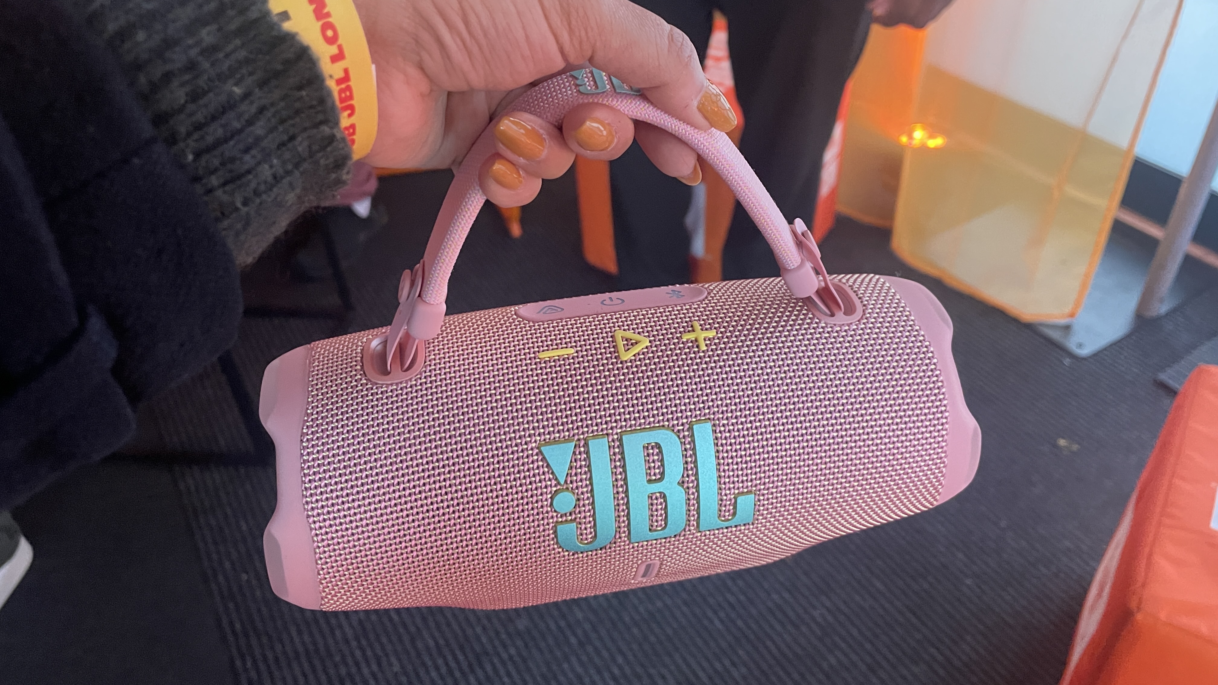 JBL Charge 6 speaker held in hand