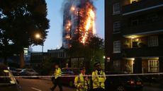 Police man a cordon as fire engulfs Grenfell Tower