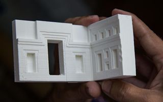 A 3D-printed model shows the perpendicular connection between the miniature gateway and "Model Stone 1."
