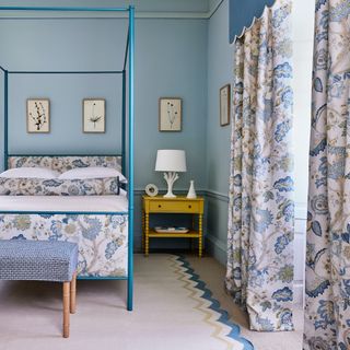 blue country bedroom with four poster bed