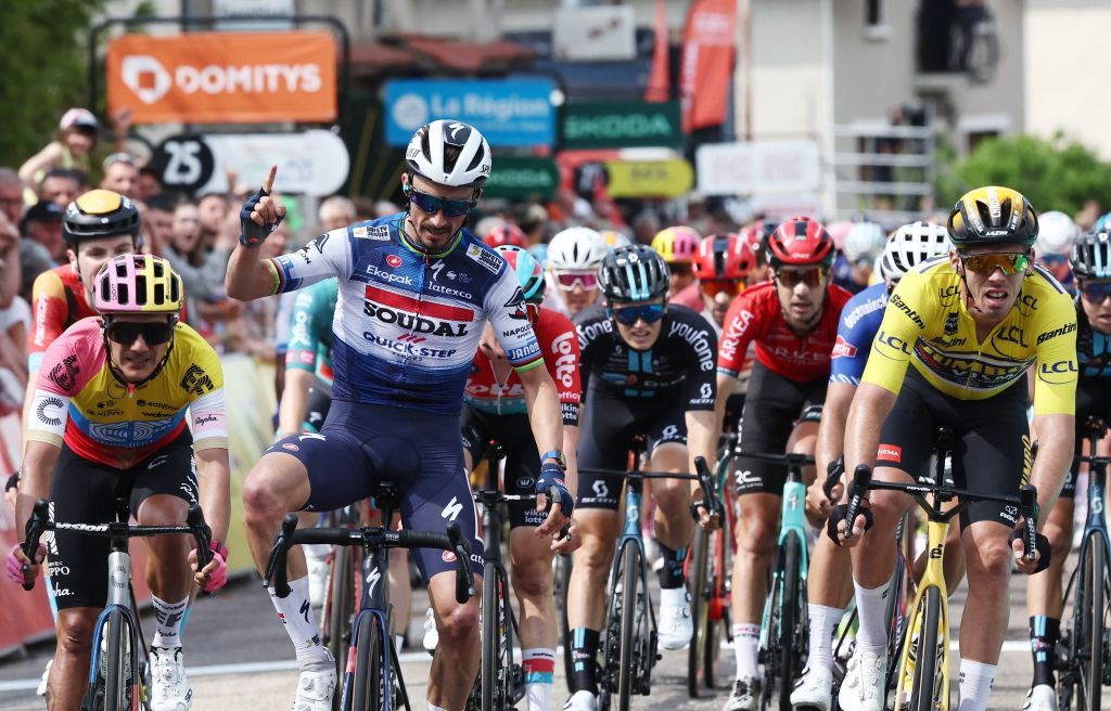TOPSHOT Soudal QuickSteps French rider Julian Alaphilippe 2ndL celebrates after winning the second stage of the 75th edition of the Criterium du Dauphine cycling race 1673 kms betwenn BrassaclesMines and La ChaiseDieu central France on June 5 2023 Photo by AnneChristine POUJOULAT AFP Photo by ANNECHRISTINE POUJOULATAFP via Getty Images