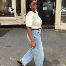 Nnenna in jeans, T-shirt and minimalist sunglasses
