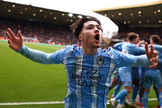 Callum O'Hare of Coventry City celebrates after Haji Wright of Coventry City (not pictured) scores his team's third goal during the Emirates FA Cup Quarter Final match between Wolverhampton Wanderers and Coventry City at Molineux on March 16, 2024 in Wolverhampton, England. (Photo by Marc Atkins/Getty Images)