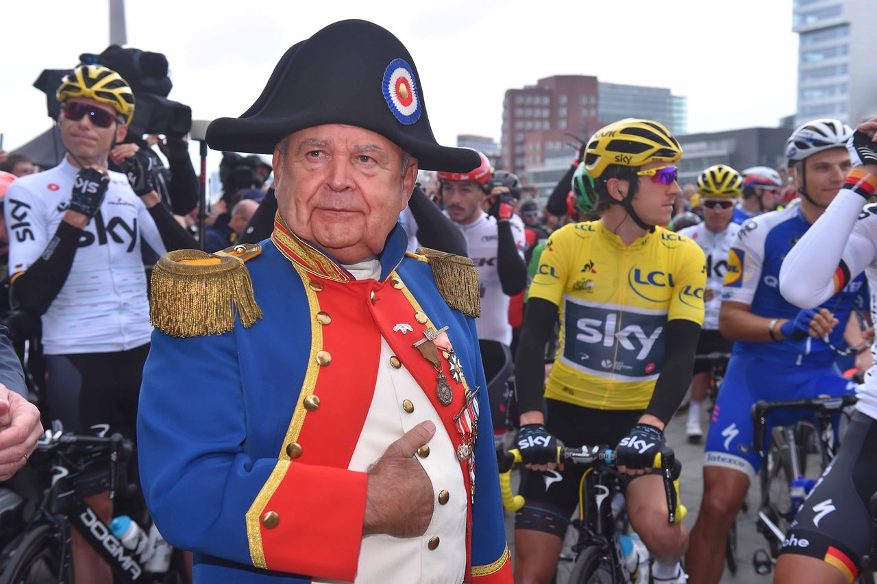 Yellow jersey Geraint Thomas and a 'foreign dignitary' at the start of the Tour de France's second stage