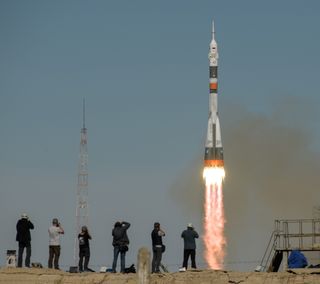 A Russian Soyuz rocket launches two astronauts toward the International Space Station on Oct. 11, 2018. A few minutes after liftoff, the rocket experienced a serious anomaly; the astronauts' Soyuz crew spacecraft safely made an emergency landing in Kazakhstan.