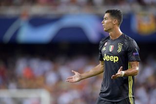 Cristiano Ronaldo reacts after receiving a red card while playing for Juventus against Valencia in September 2018.