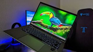 Image of the HP ZBook Firefly 14" (G10) open and held in a hand at an angle.