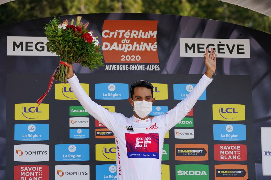 MEGEVE FRANCE AUGUST 15 Podium Daniel Felipe Martinez Poveda of Colombia and Team EF Pro Cycling White Best Young Jersey Celebration Flowers Covid safety measures during the 72nd Criterium du Dauphine 2020 Stage 4 a 1533km stage from Ugine to Megeve 1458m dauphine Dauphin on August 15 2020 in Megeve France Photo by Eddy LemaistrePool via Getty Images