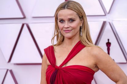 Reese Witherspoon arrives at the Oscars on Sunday, April 25, 2021, at Union Station in Los Angeles. (AP Photo/Chris Pizzello, Pool)