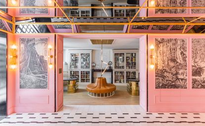 Room in the Room Mate Emir Hotel, Istanbul, Turkey with mirrored ceiling, pink panels walls and wall art