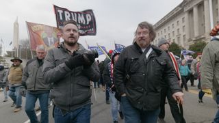 Director Cullen Hoback, left, and 8Chan owner Jim Watkins in Q: Into the Storm on HBO Max.