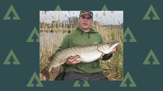 How to find big pike - Alan Dudhill holding a big pike