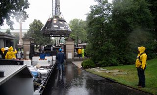The Orion capsule needed to be lifted over the fence surrounding the White House for the vessel's display day on July 22, 2018.