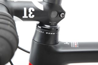 Argon 18 has novel headset design, where spacers go below the top bearing for improved rigidity