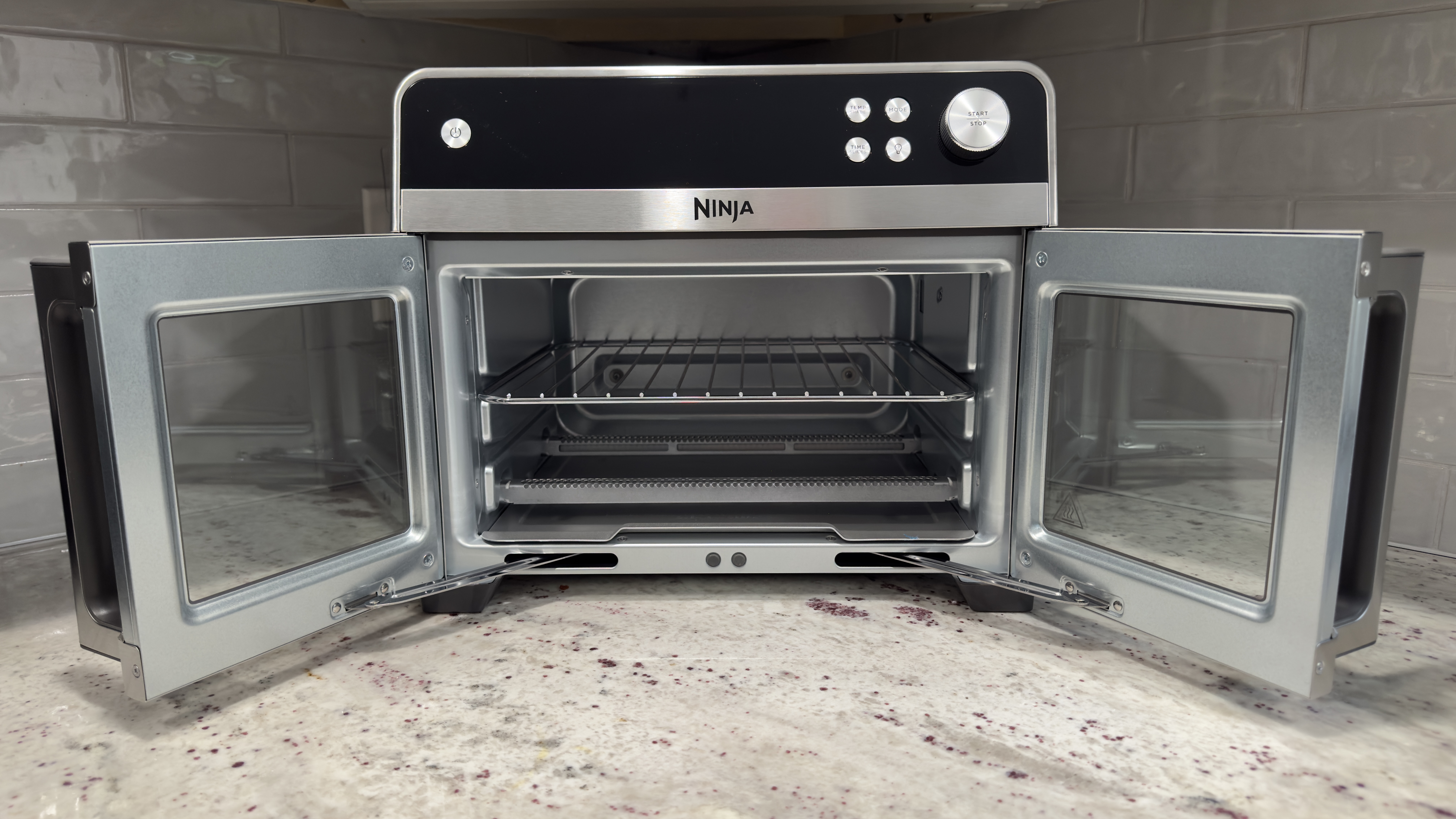 Ninja French Door Air Fryer and Countertop Oven open with rack set to higher slot