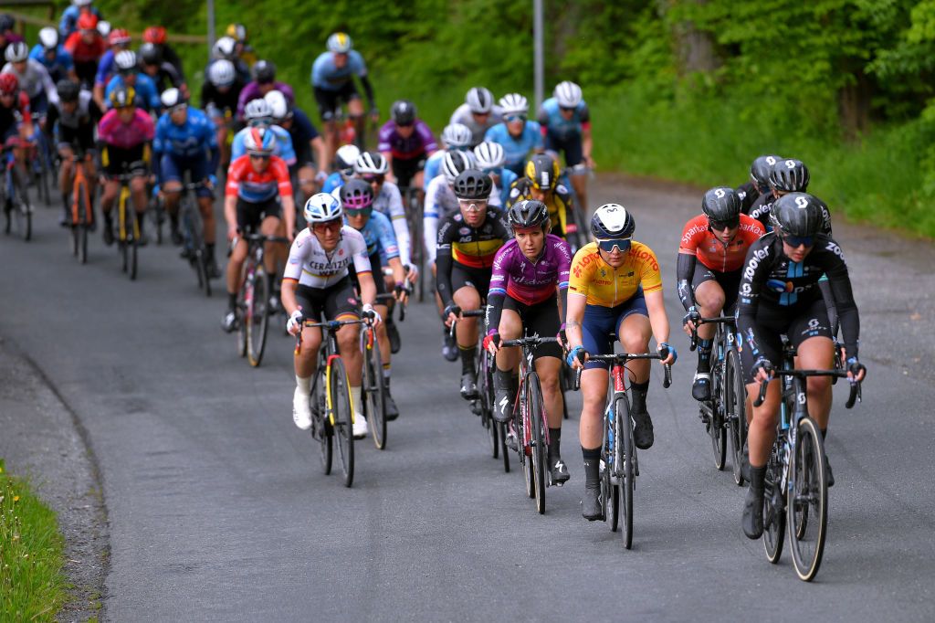 GERA GERMANY MAY 26 Amy Pieters of Netherlands and Team SD Worx Lisa Brennauer of Germany and Ceratizit WNT Pro Cycling Team Emma Norsgaard Jorgensen of Denmark and Movistar Team yellow leader jersey Lorena Wiebes of Netherlands and Team DSM red best young jersey The peloton during the 34th Internationale LOTTO Thringen Ladies Tour 2021 Stage 2 a 1251km stage from Gera to Gera ltlt2021 lottothueringenladiestour womencycling on May 26 2021 in Gera Germany Photo by Luc ClaessenGetty Images