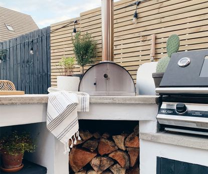 This blue DIY outdoor kitchen is filled with clever features | Gardeningetc