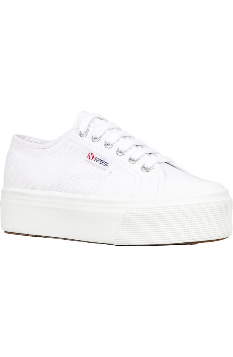 white platform sneakers by Superga