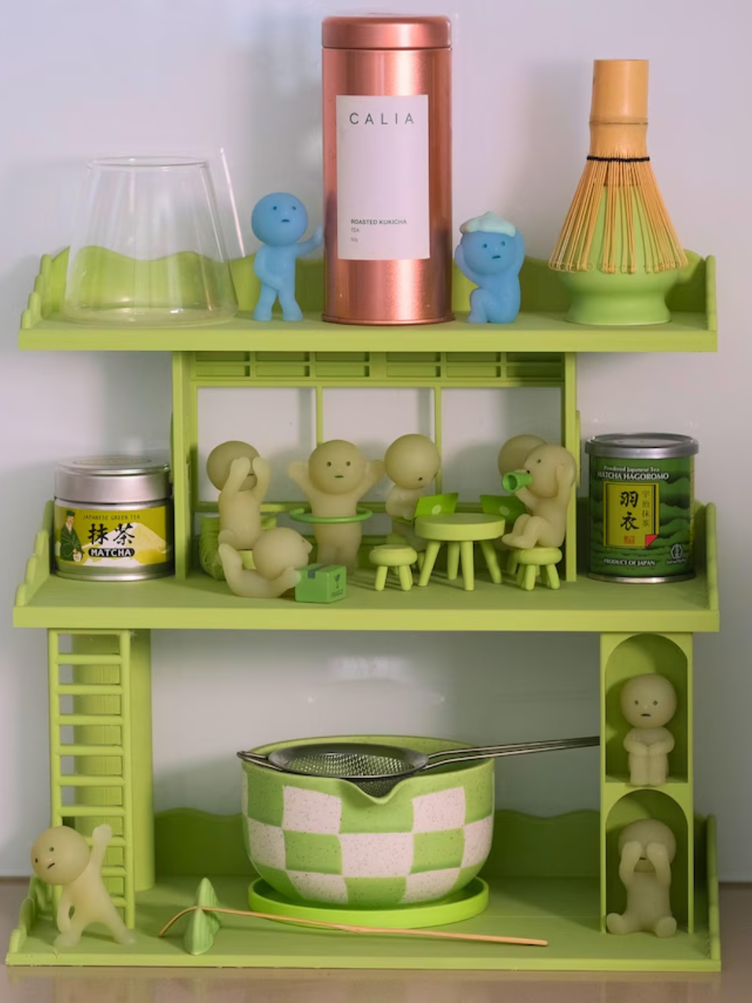 A Smiski-themed green three-tier matcha station from Etsy
