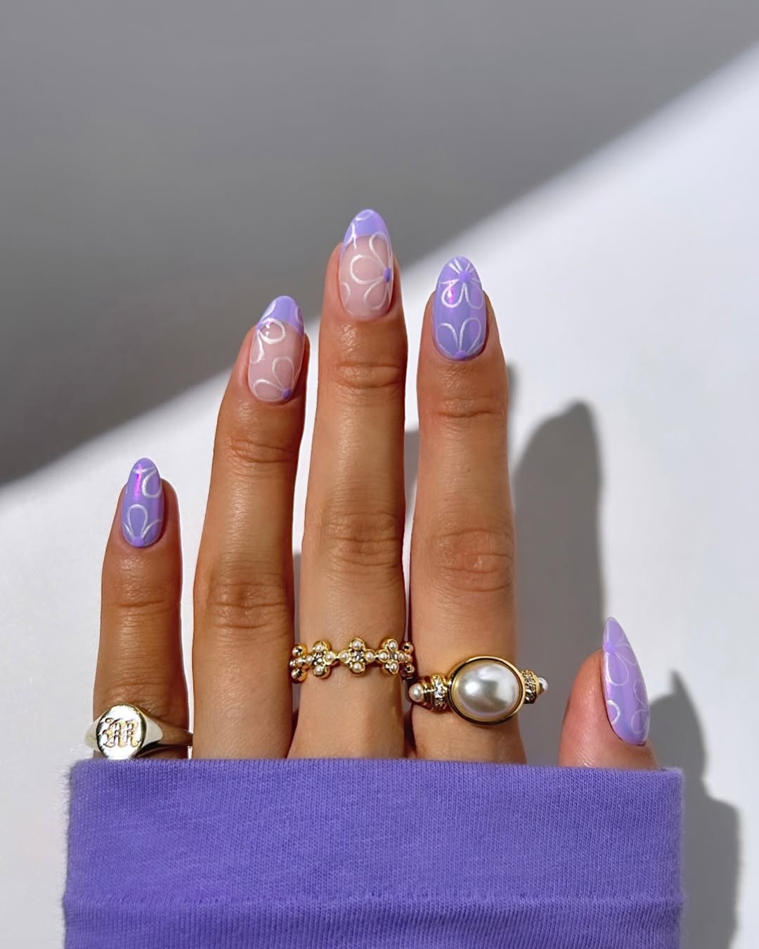 purple chrome manicure with lilac designs