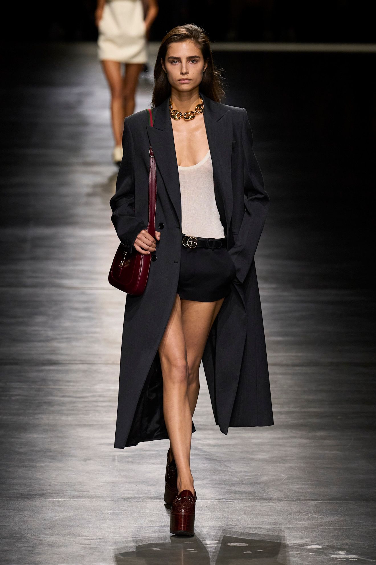 An image of a white tank top on Gucci's Spring/Summer 2024 runway.