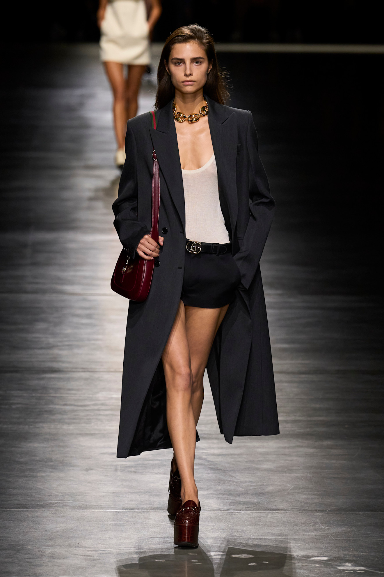 An image of a white tank top on Gucci's Spring/Summer 2024 runway.