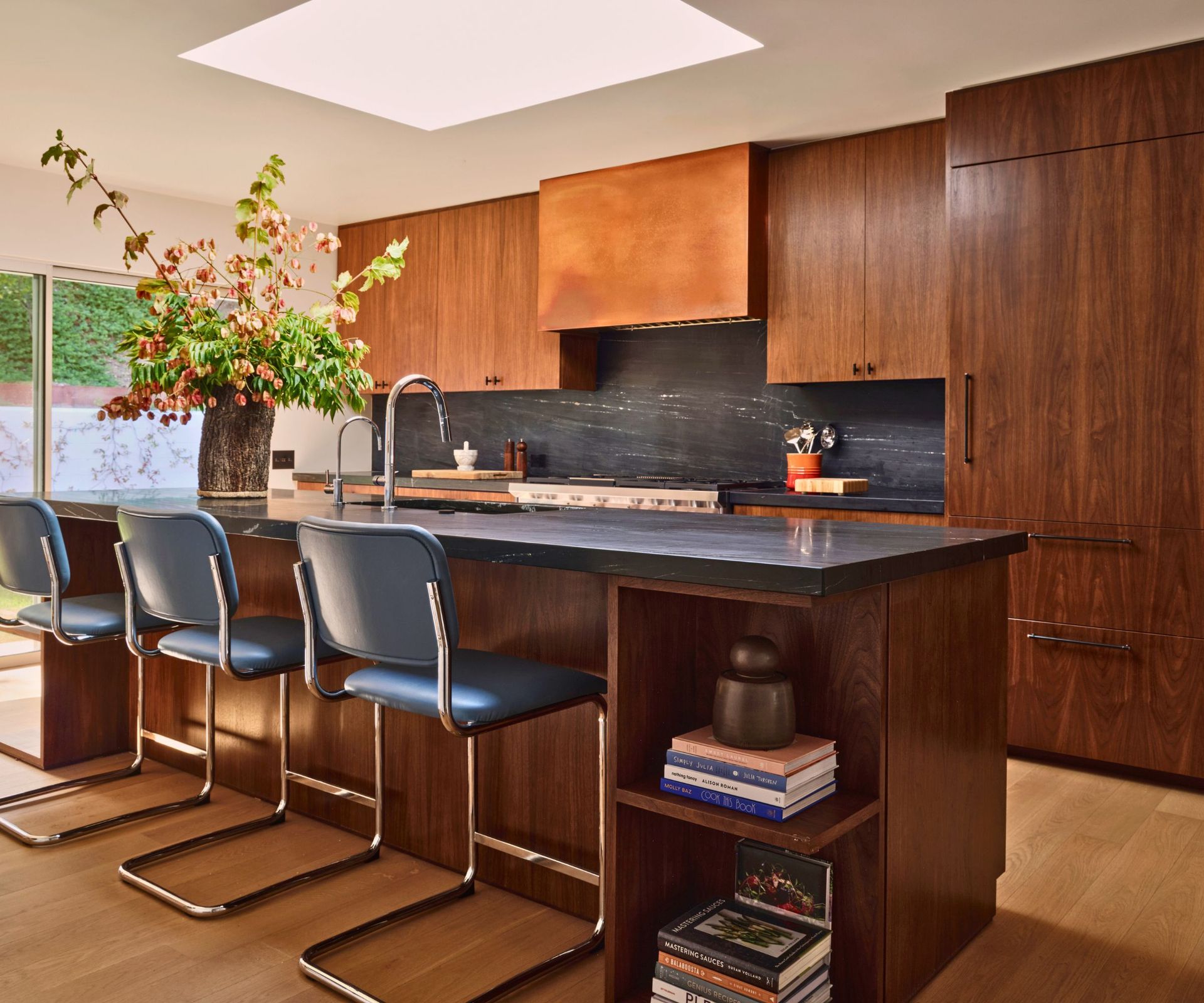 kitchen with walnut cabinets and island