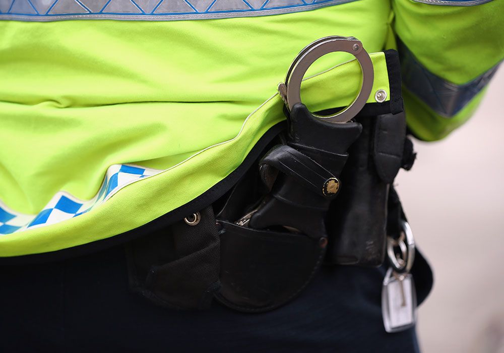 policeman with handcuffs