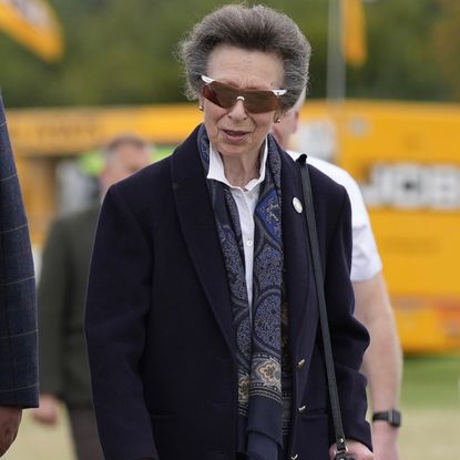 Princess Anne wearing a coat and paisley scarf