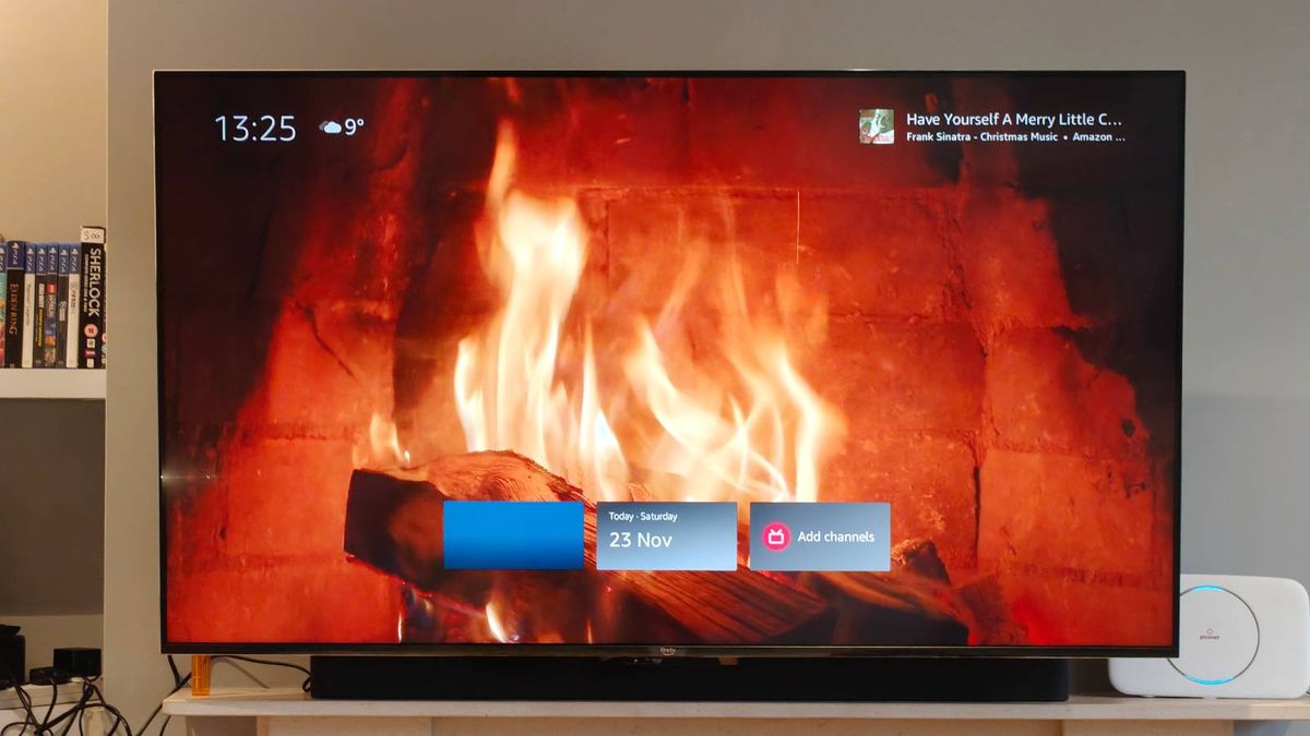 The Amazon Fire TV Omni Mini-LED displaying a log-burning display.