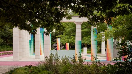 colourful columns in a park for Temple of Boom, the 2022 NGV Architecture Commission