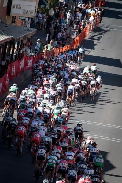 Crowds watch as the race rolls past