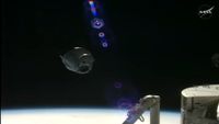 This screenshot shows SpaceX's robotic Dragon cargo spacecraft departing the International Space Station on June 16, 2026.