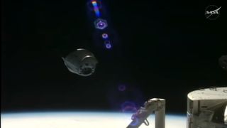 This screenshot shows SpaceX's robotic Dragon cargo spacecraft departing the International Space Station on June 16, 2026.