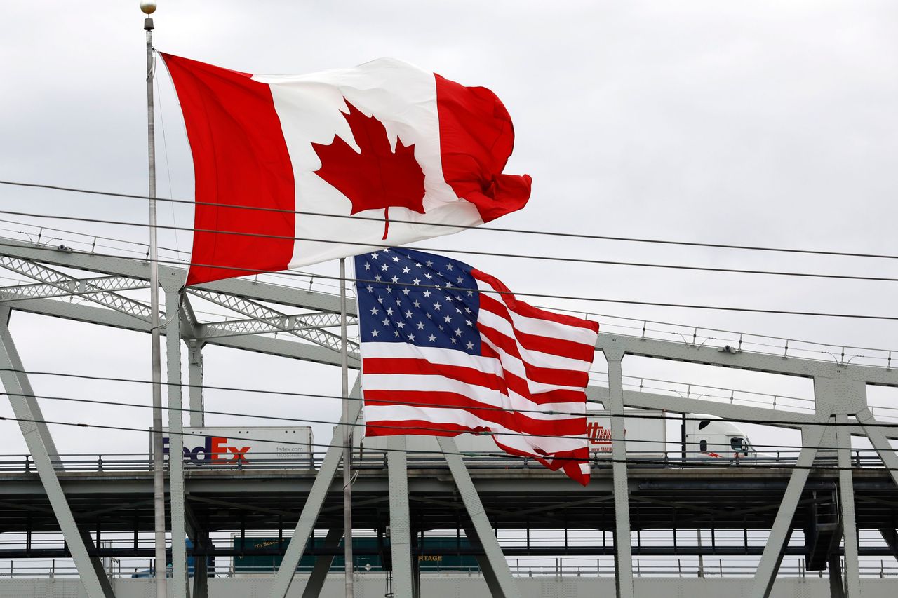 Canadian and American flags